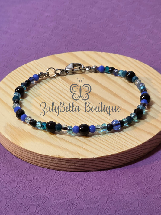 Cord Bracelet with Lobster Clasp - Black and Blue Glass Bead mix.