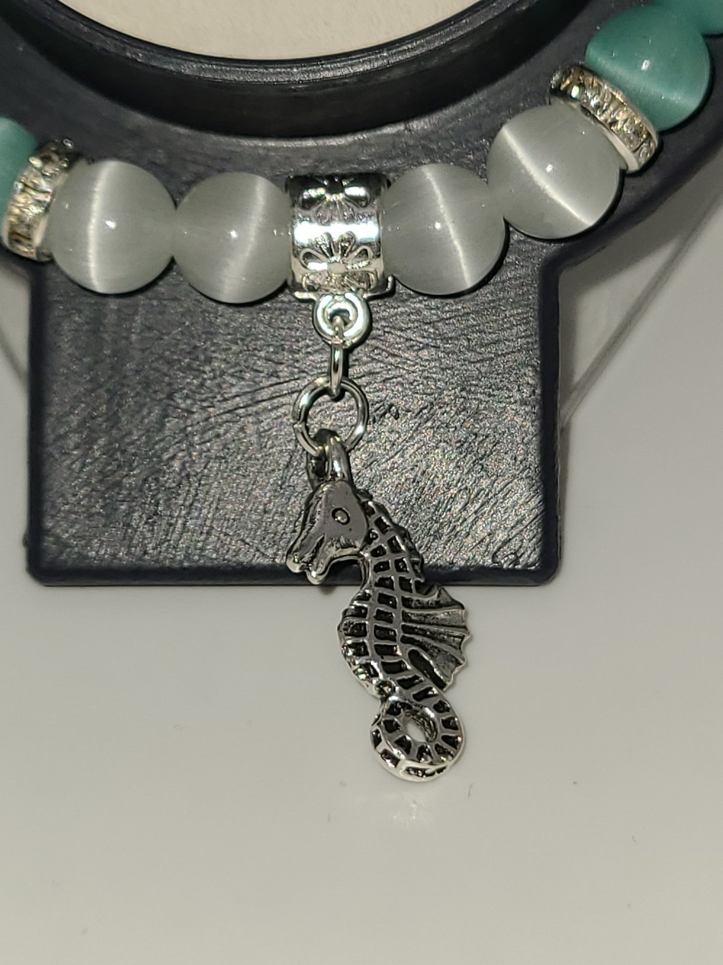 Iceberg Frost and White Cat Eye Beaded Bracelet with Seahorse Charm